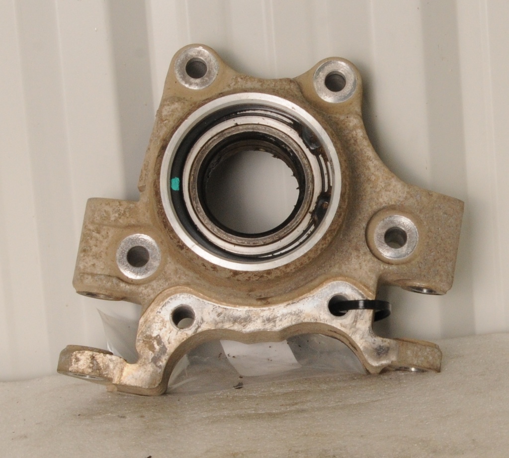 WHEEL BEARING CARRIER, LEFT